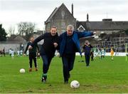 16 December 2018; Former Dublin footballer Charlie Redmond is tackled by former Meath footballer Graham Geraghty as he prepares to take a penalty in a half-time competition during the Seán Cox Fundraising match between Meath and Dublin at Páirc Tailteann in Navan, Co Meath. Photo by Piaras Ó Mídheach/Sportsfile