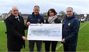 16 December 2018; Martina Cox, wife of Seán Cox, is presented with a cheque by, from left, John Kavanagh, Vice Chairman Meath GAA, Fergus McNulty, Chairman of St Peter's Dunboyne, and Peter O'Halloran, Chairman Meath GAA, before the Seán Cox Fundraising match between Meath and Dublin at Páirc Tailteann in Navan, Co Meath. Photo by Piaras Ó Mídheach/Sportsfile