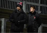20 December 2018; Derry players Chrissy McKaigue, left, and Brendan Rodgers watch on from the terrace during the Bank of Ireland Dr. McKenna Cup Round 1 match between Derry and Tyrone at Celtic Park, Derry. Photo by Oliver McVeigh/Sportsfile
