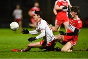 20 December 2018; Darragh Canavan of Tyrone in action against Paul McNeill of Derry during the Bank of Ireland Dr. McKenna Cup Round 1 match between Derry and Tyrone at Celtic Park, Derry. Photo by Oliver McVeigh/Sportsfile