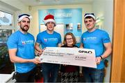 21 December 2018; Claire Shiels, Corporate Fundraiser with Lauralynn Ireland's Children's Hospice, with, from left, Tipperary hurler Patrick Maher, Dublin footballers Con O'Callaghan and Brian Howard in attendance at the LauraLynn Charitable Donation at the LauraLynn Children's Hospice in Dublin. Photo by Matt Browne/Sportsfile
