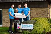21 December 2018; Claire Shiels, Corporate Fundraiser with Lauralynn Ireland's Children's Hospice, with, from left Tipperary hurler Patrick Maher, Dublin footballers Brian Howard and Con O'Callaghan in attendance at the LauraLynn Charitable Donation at the LauraLynn Children's Hospice in Dublin. Photo by Matt Browne/Sportsfile
