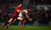 21 December 2018; Robert Baloucoune of Ulster in action against Darren Sweetnam of Munster during the Guinness PRO14 Round 11 match between Ulster and Munster at the Kingspan Stadium in Belfast. Photo by Ramsey Cardy/Sportsfile