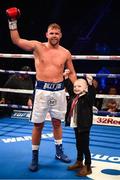 22 December 2018; Billy Joe Saunders celebrates with Denver Clinton, age 4, from Durham, England, after defeating Charles Agamu in their middleweight bout at the Manchester Arena in Manchester, England. Photo by David Fitzgerald/Sportsfile