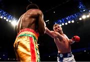 22 December 2018; Billy Joe Saunders, right, in action against Charles Agamu during their middleweight bout at the Manchester Arena in Manchester, England. Photo by David Fitzgerald/Sportsfile