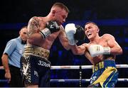22 December 2018; Carl Frampton, left, in action against Josh Warrington during their IBF World Featherweight title bout at the Manchester Arena in Manchester, England. Photo by David Fitzgerald/Sportsfile