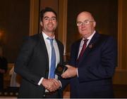 22 December 2018; Michael Darragh Macauley of Dublin is presented with his GAA Football All-Ireland Senior Championship medal by Uachtarán Chumann Lúthchleas Gael John Horan at the InterContinental Dublin, Simmonscourt Road, Ballsbridge, Dublin Photo by Ray McManus/Sportsfile