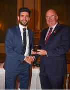 22 December 2018; Cian O'Sullivan of Dublin is presented with his GAA Football All-Ireland Senior Championship medal by Uachtarán Chumann Lúthchleas Gael John Horan at the InterContinental Dublin, Simmonscourt Road, Ballsbridge, Dublin Photo by Ray McManus/Sportsfile