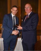 22 December 2018; Eoghan O'Gara of Dublin is presented with his GAA Football All-Ireland Senior Championship medal by Uachtarán Chumann Lúthchleas Gael John Horan at the InterContinental Dublin, Simmonscourt Road, Ballsbridge, Dublin Photo by Ray McManus/Sportsfile