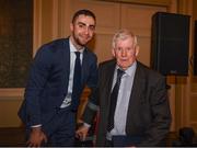 22 December 2018; James Mccarthy of Dublin presents a medal to Buster Leahy, a member of the 1958 All Ireland winning Dublin team, who were guests of honour at presentation of the 2108 GAA Football All-Ireland Senior Championship medals at the InterContinental Dublin, Simmonscourt Road, Ballsbridge, Dublin Photo by Ray McManus/Sportsfile