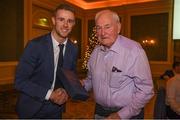 22 December 2018; Paul Mannion of Dublin presents a medal to Mark Wilson, a member of the 1958 All Ireland winning Dublin team, who were guests of honour at presentation of the 2108 GAA Football All-Ireland Senior Championship medals at the InterContinental Dublin, Simmonscourt Road, Ballsbridge, Dublin Photo by Ray McManus/Sportsfile