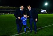 22 December 2018; Matchday mascot 8 year old James Walsh, from Leopardstown, Dublin, with Leinster players Jack McGrath and Josh van der Flier ahead of the Guinness PRO14 Round 11 match between Leinster and Connacht at the RDS Arena in Dublin. Photo by Ramsey Cardy/Sportsfile