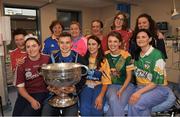 25 December 2018; Eoin Murchan with staff on duty in the A and E department, Imenda Farren, Loughrea, Co Galway, Anne Marie McGuire, Kilmurry Ibrickane, Clare, Kiera Byrne, Ardcath, Meath, Ruth Dunne, Birr, Offaly, Hannagh O'Farrel, Cork, Anne Lynch, Longford, Maeve O'Sullivan, Clonmel, Tipperary, Alice Griffin, Ballybofey, Donegal, Lyndsey Singleton, Donamede, Dublin, and Orla O'Farrell, Edgeworthstown, Longford, and the Sam Maguire Cup during the Dublin Football team visit to Beaumont Hospital in Dublin.  Photo by Ray McManus/Sportsfile