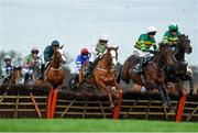 27 December 2018; Runners and riders jump the first fence during the Paddy Power 'Only 363 Days Till Christmas' 3-Y-O Maiden Hurdle during day two of the Leopardstown Festival at Leopardstown Racecourse in Dublin. Photo by Eóin Noonan/Sportsfile