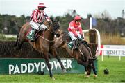 27 December 2018; Paloma Blue, left, with Mark Walsh up, on their way to winning as Real Steel, right, with Paul Townsend up, falls at the last, during the Paddy Power 'Live Stream All Irish Racing On Our App' Beginners Steeplechase during day two of the Leopardstown Festival at Leopardstown Racecourse in Dublin. Photo by Eóin Noonan/Sportsfile