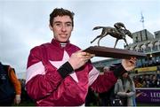 28 December 2018; Jack Kennedy with the trophy after winning the Squared Financial Christmas Hurdle on Apple's Jade during day three of the Leopardstown Festival at Leopardstown Racecourse in Dublin. Photo by David Fitzgerald/Sportsfile