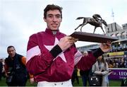 28 December 2018; Jack Kennedy with the trophy after winning the Squared Financial Christmas Hurdle on Apple's Jade during day three of the Leopardstown Festival at Leopardstown Racecourse in Dublin. Photo by David Fitzgerald/Sportsfile