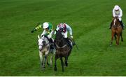 29 December 2018; Good Thyne Tara, with David Mullins up, second left, races ahead of Elimay, with Mark Walsh up, on their way to winning the Advent Insurance Irish EBF Mares Hurdle during day four of the Leopardstown Festival at Leopardstown Racecourse in Dublin. Photo by David Fitzgerald/Sportsfile