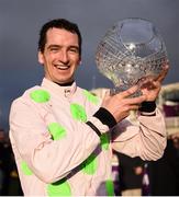 29 December 2018; Patrick Mullins celebrates with the trophy after winning the Ryanair Hurdle on Sharjah during day four of the Leopardstown Festival at Leopardstown Racecourse in Dublin. Photo by David Fitzgerald/Sportsfile