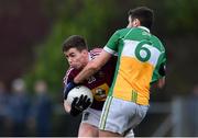 29 December 2018; Ger Egan of Westmeath in action against Paul McConway of Offaly during the Bord na Móna O'Byrne Cup Round 2 match between Westmeath and Offaly at Lakepoint Park, St Loman's GAA Club in Mullingar, Westmeath. Photo by Piaras Ó Mídheach/Sportsfile