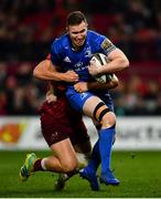29 December 2018; Rory O'Loughlin of Leinster is tackled by Dan Goggin of Munster during the Guinness PRO14 Round 12 match between Munster and Leinster at Thomond Park in Limerick. Photo by Ramsey Cardy/Sportsfile