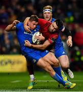 29 December 2018; Jordan Larmour of Leinster is tackled by Conor Murray of Munster during the Guinness PRO14 Round 12 match between Munster and Leinster at Thomond Park in Limerick. Photo by Ramsey Cardy/Sportsfile