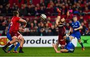 29 December 2018; Andrew Conway of Munster is tackled by James Lowe of Leinster, for which James Lowe was shown a red card, during the Guinness PRO14 Round 12 match between Munster and Leinster at Thomond Park in Limerick. Photo by Ramsey Cardy/Sportsfile