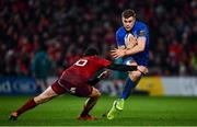 29 December 2018; Garry Ringrose of Leinster is tackled by Joey Carbery of Munster during the Guinness PRO14 Round 12 match between Munster and Leinster at Thomond Park in Limerick. Photo by Ramsey Cardy/Sportsfile