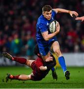 29 December 2018; Garry Ringrose of Leinster is tackled by Joey Carbery of Munster during the Guinness PRO14 Round 12 match between Munster and Leinster at Thomond Park in Limerick. Photo by Ramsey Cardy/Sportsfile