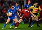 29 December 2018; Jordan Larmour of Leinster in action against Mike Haley of Munster during the Guinness PRO14 Round 12 match between Munster and Leinster at Thomond Park in Limerick. Photo by Ramsey Cardy/Sportsfile