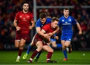 29 December 2018; Mike Haley of Munster is tackled by Garry Ringrose of Leinster during the Guinness PRO14 Round 12 match between Munster and Leinster at Thomond Park in Limerick. Photo by Ramsey Cardy/Sportsfile