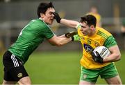 30 December 2018; Jamie Brennan of Donegal in action against Conor McCloskey of Queens University Belfast during the Bank of Ireland Dr McKenna Cup Round 1 match between Donegal and QUB at MacCumhaill Park in Ballybofey, Donegal. Photo by Oliver McVeigh/Sportsfile