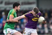5 January 2019; Niall Hughes of Wexford in action against Ben Brennan of Meath during the Bord na Móna O'Byrne Cup Round 3 match between Wexford and Meath at St Patrick's Park in Wexford. Photo by Matt Browne/Sportsfile