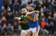 5 January 2019; Jason Forde of Tipperary scores his side's first goal despite the tackle of John Buckley of Kerry during the Co-Op Superstores Munster Hurling League 2019 match between Tipperary and Kerry at MacDonagh Park in Nenagh, Co. Tipperary. Photo by Eóin Noonan/Sportsfile