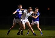 5 January 2019; Conor McGraynor of Wicklow in action against Eoin Buggie, left, and David Seale of Laois during the Bord na Móna O'Byrne Cup Round 3 match between Wiclow and Laois at Bray Emmets GAA Club in Bray, Wicklow. Photo by Harry Murphy/Sportsfile