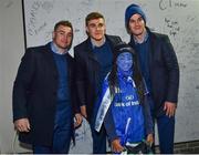 5 January 2019; Leinster players Jonathan Sexton, Garry Ringrose and Jordan Larmour with young supporter Simi Shanu, age 9, from Dundrum, Dublin, in 'Autograph Alley' prior to the Guinness PRO14 Round 13 match between Leinster and Ulster at the RDS Arena in Dublin. Photo by Seb Daly/Sportsfile