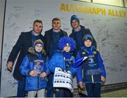 5 January 2019; Leinster players Jonathan Sexton, Garry Ringrose and Jordan Larmour with supporters, from left, Paul Corneliusson, age 9, Sam Casey, age 8, and Jack Casey, age 10, in 'Autograph Alley' prior to the Guinness PRO14 Round 13 match between Leinster and Ulster at the RDS Arena in Dublin. Photo by Seb Daly/Sportsfile