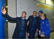 5 January 2019; Leinster players Jonathan Sexton, Garry Ringrose and Jordan Larmour with young supporter Holly Boylan, from Banagher, Co. Offaly, in 'Autograph Alley' prior to the Guinness PRO14 Round 13 match between Leinster and Ulster at the RDS Arena in Dublin. Photo by Seb Daly/Sportsfile