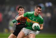 6 January 2019; Paddy Maguire of Leitrim in action against Colm Moran of Mayo during the Connacht FBD League Preliminary Round match between Leitrim and Mayo at Avantcard Páirc Seán Mac Diarmada in Carrick-on-Shannon, Co Leitrim. Photo by Stephen McCarthy/Sportsfile