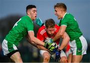 6 January 2019; Ruairi Deane of Cork is tackled by Paiul Maher left, and Gordon Brown of Limerick during the McGrath Cup Semi-final between Limerick and Cork at Mick Neville Park in Rathkeale, Co. Limerick. Photo by Ramsey Cardy/Sportsfile
