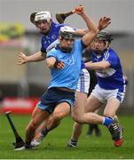 6 January 2019; Cian Boland of Dublin in action against Ryan Mullaney, left, and Colm Stapleton of Laois during the Bord na Mona Walsh Cup Round 3 match between Laois and Dublin at O'Moore Park in Portlaoise, Laois. Photo by Brendan Moran/Sportsfile