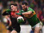 6 January 2019; Colm Moran of Mayo in action against Fergal McTague of Leitrim during the Connacht FBD League Preliminary Round match between Leitrim and Mayo at Avantcard Páirc Seán Mac Diarmada in Carrick-on-Shannon, Co Leitrim. Photo by Stephen McCarthy/Sportsfile