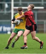 6 January 2019; Conor Morrison of Donegal in action against Jerome Johnston of Down during the Bank of Ireland Dr McKenna Cup Round 2 match between Down and Donegal at Pairc Esler, Newry, Co. Down. Photo by Oliver McVeigh/Sportsfile