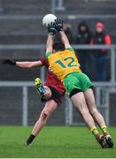 6 January 2019; Paul Devlin of Down has a shot blocked by Caolan McGonigle of Donegal during the Bank of Ireland Dr McKenna Cup Round 2 match between Down and Donegal at Pairc Esler, Newry, Co. Down. Photo by Oliver McVeigh/Sportsfile