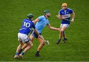 6 January 2019; Chris Crummey of Dublin in action against Aaron Dunphy, left, and Mark Kavanagh of Laois during the Bord na Mona Walsh Cup Round 3 match between Laois and Dublin at O'Moore Park in Portlaoise, Laois. Photo by Brendan Moran/Sportsfile