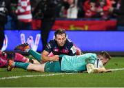 11 January 2019; Rory Scannell of Munster dives over to score his side's second try, despite the tackle of Callum Braley of Gloucester, during the Heineken Champions Cup Pool 2 Round 5 match between Gloucester and Munster at Kingsholm Stadium in Gloucester, England. Photo by Seb Daly/Sportsfile