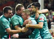 11 January 2019; Keith Earls of Munster, centre, is congratulated by team-mates after scoring his side's third try during the Heineken Champions Cup Pool 2 Round 5 match between Gloucester and Munster at Kingsholm Stadium in Gloucester, England. Photo by Seb Daly/Sportsfile