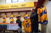 12 January 2019; Clare kitman Jim Marrinan is assisted by his nephew Sean Marrinan in the dressing room prior to the McGrath Cup Final match between Cork and Clare at Hennessy Park in Miltown Malbay, Co. Clare. Photo by Diarmuid Greene/Sportsfile