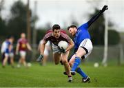 12 January 2019; Sam Duncan of Westmeath in action against Michael Quinn of Longford during the Bord na Mona O'Byrne Cup semi-final match between Westmeath and Longford at Downs GAA Club in Westmeath. Photo by Sam Barnes/Sportsfile