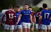 12 January 2019; Andrew Farrell of Longford, centre and Joe Halligan of Westmeath shake hands following the Bord na Mona O'Byrne Cup semi-final match between Westmeath and Longford at Downs GAA Club in Westmeath. Photo by Sam Barnes/Sportsfile